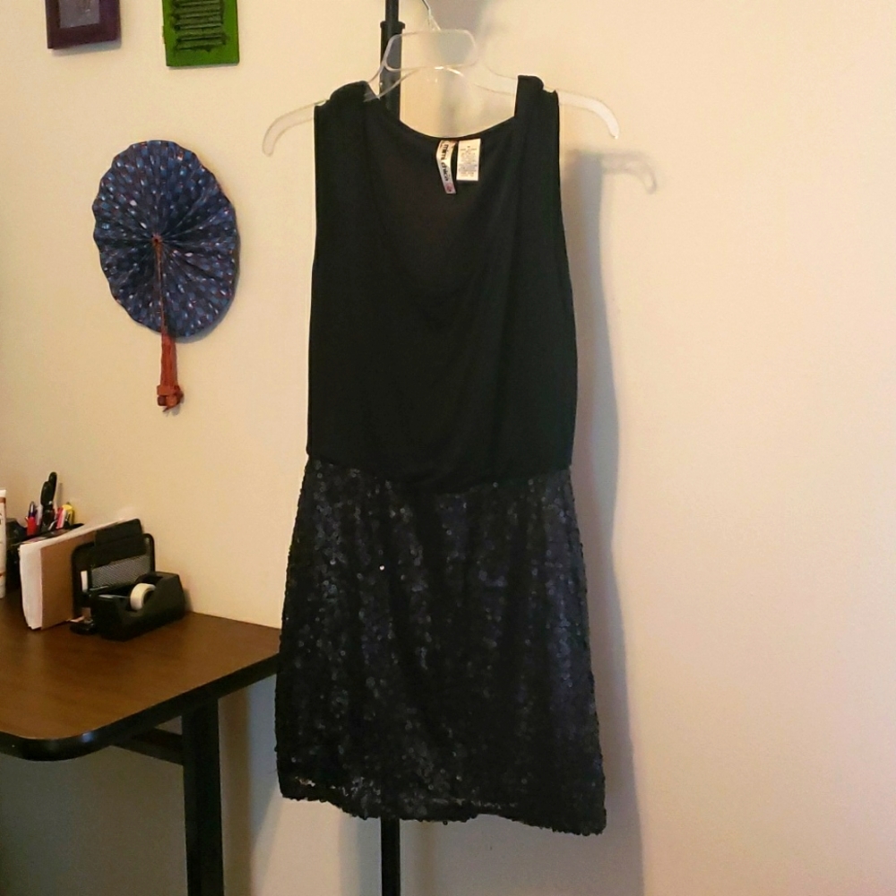 Black dress with tank top and sequin bottom